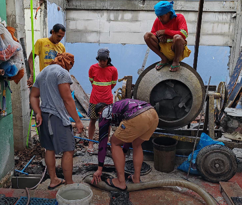 Service crew preparing equipment